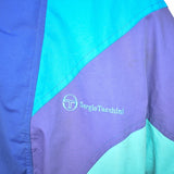 Vintage Sergio Tacchini puffer jacket windbreaker track jacket bomber jacket in blue purple and cyan