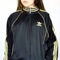Vintage Adidas tracksuit track jacket fleece windbreaker in black and gold